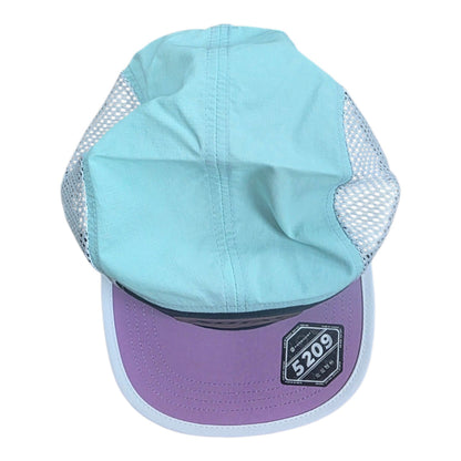 SOTAR five-panel performance hat in light blue and purple with white mesh side panels and a branded leather patch.