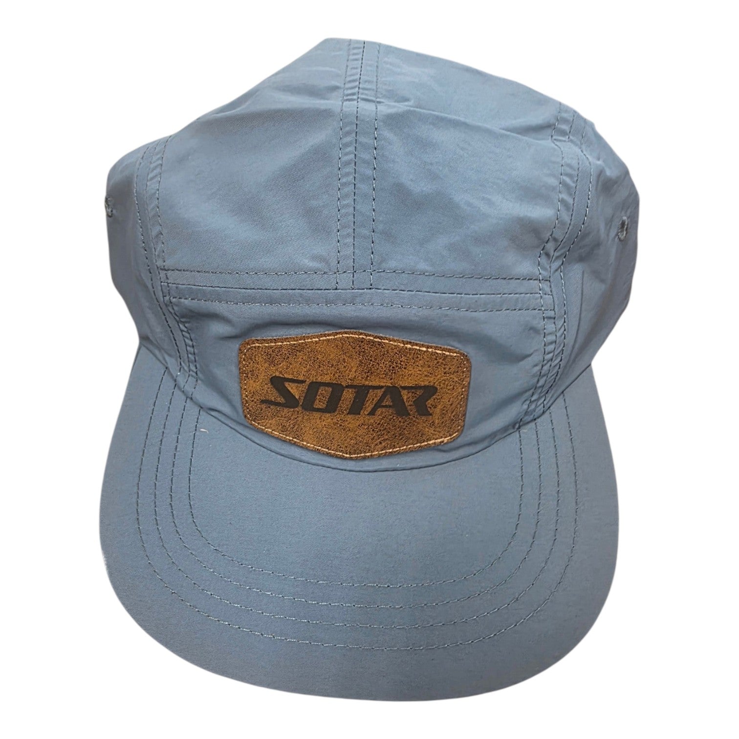 SOTAR five-panel performance hat in light blue nylon with a textured brown faux-leather logo patch on the front